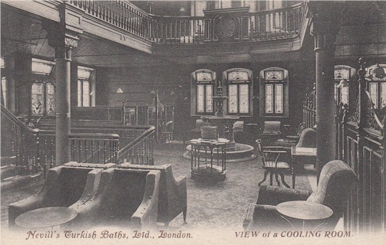 View of the Gentlemen's cooling-room and part of the Gallery in Nevill's Turkish baths in Northumberland Avenue.The fountain was in Doultons' Lambeth faïence. A decade later, a similar one was included in the cooling-room at the New Broad Street baths.